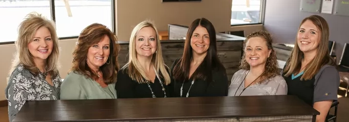 Chiropractor Andover MN Karrie Lehn And Kerri Norring With Staff